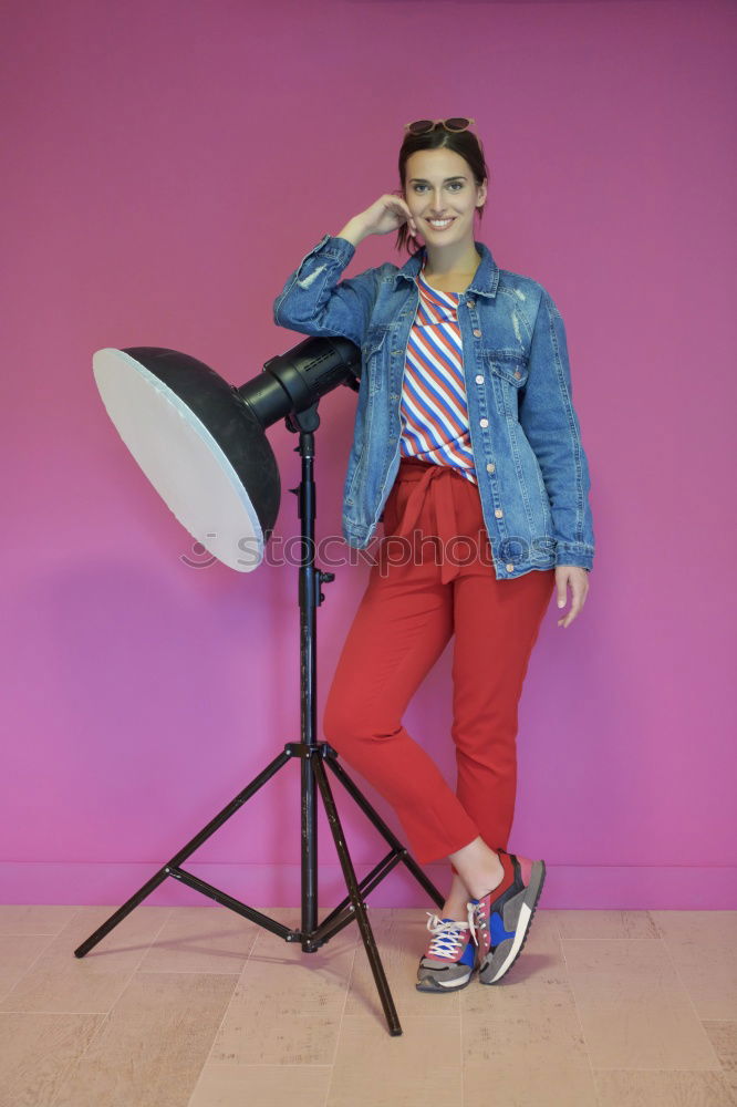 Similar – Woman on stool in studio