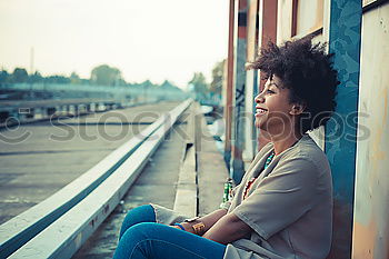 Similar – Image, Stock Photo Beautiful African girl with curly hair on the rooftop