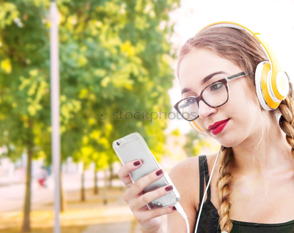 Similar – Happy caucasian women listening to music on smart phone