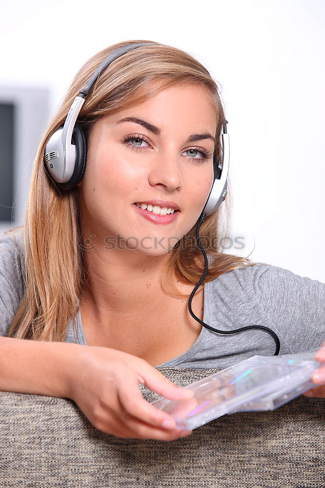 Similar – Image, Stock Photo Young blonde girl using a smartphone while sitting
