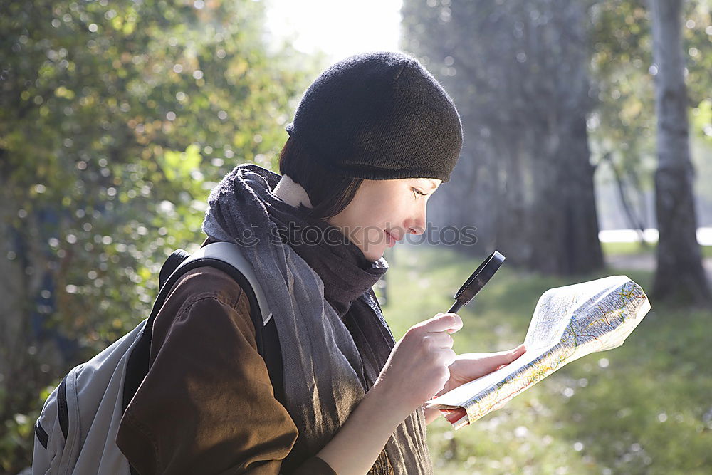 Similar – Image, Stock Photo Young hiking woman taking notes in the nature