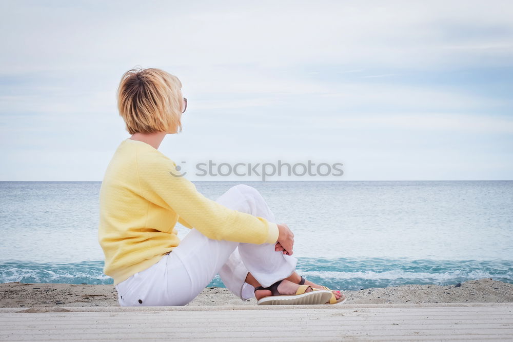 Similar – Image, Stock Photo Thoughtful child sit at waterfront. Back view