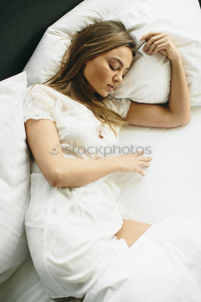 Similar – caucasian woman lying on sofa at home