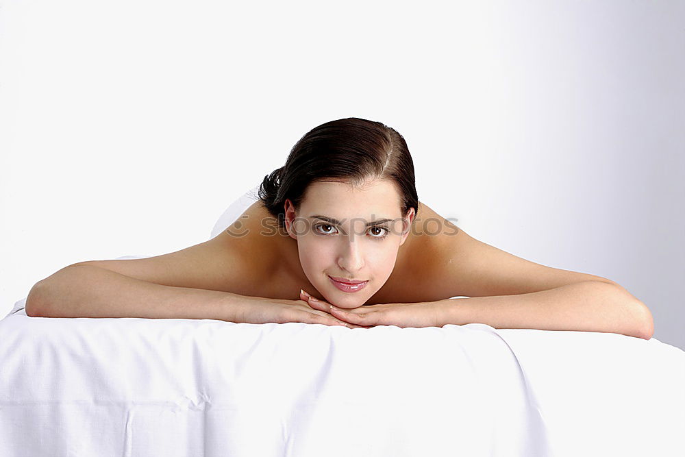 Similar – Image, Stock Photo Woman lying on wooden table with crossed naked strong legs