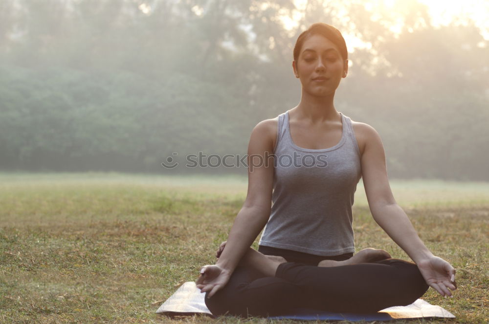 Similar – Woman Meditating And Practicing Yoga, Padmasana.