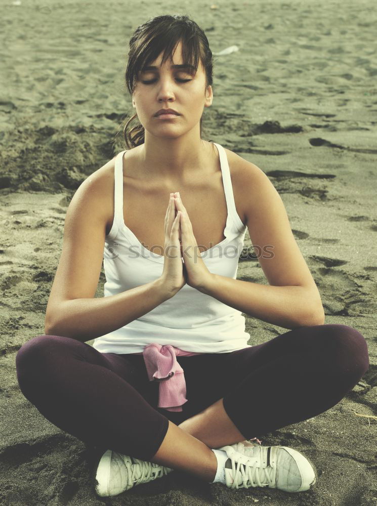 Similar – Young woman meditates in yoga asana Padmasana