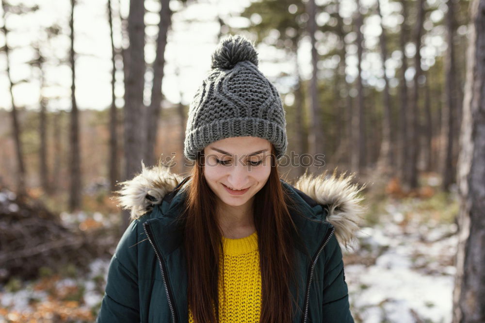 Similar – Young woman wrapped warm against the cold