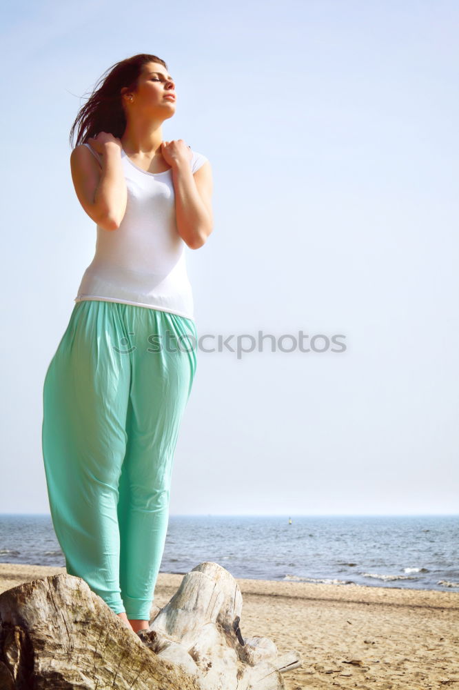 Similar – Image, Stock Photo Woman walking away on the idylic beach.