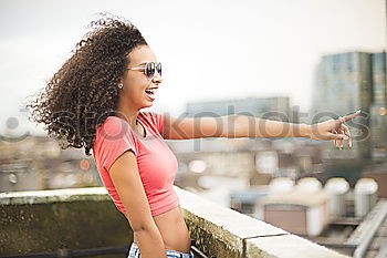 Similar – beautiful mixed girl listening to the music happy in the street