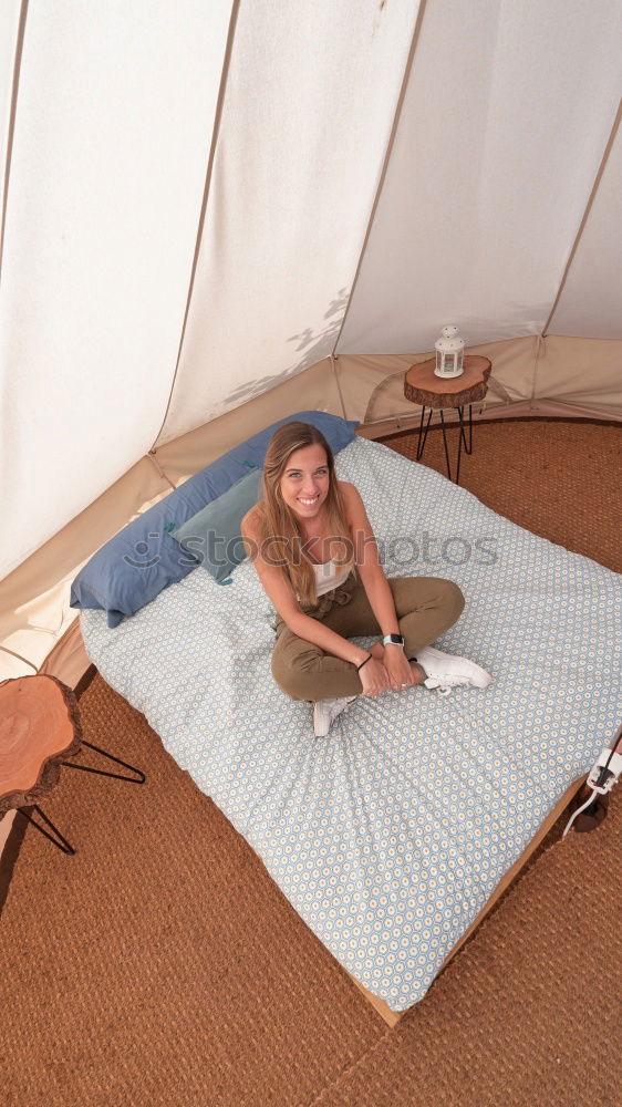 Similar – Image, Stock Photo Girl watching movie online on smartphone sitting on bed at home