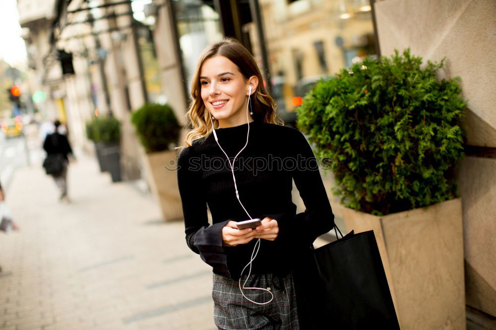 Similar – Image, Stock Photo Portrait of young woman smiling in urban background