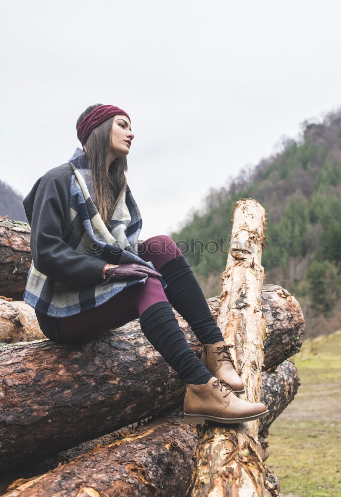 Similar – Happy girl posing on the stones of a river