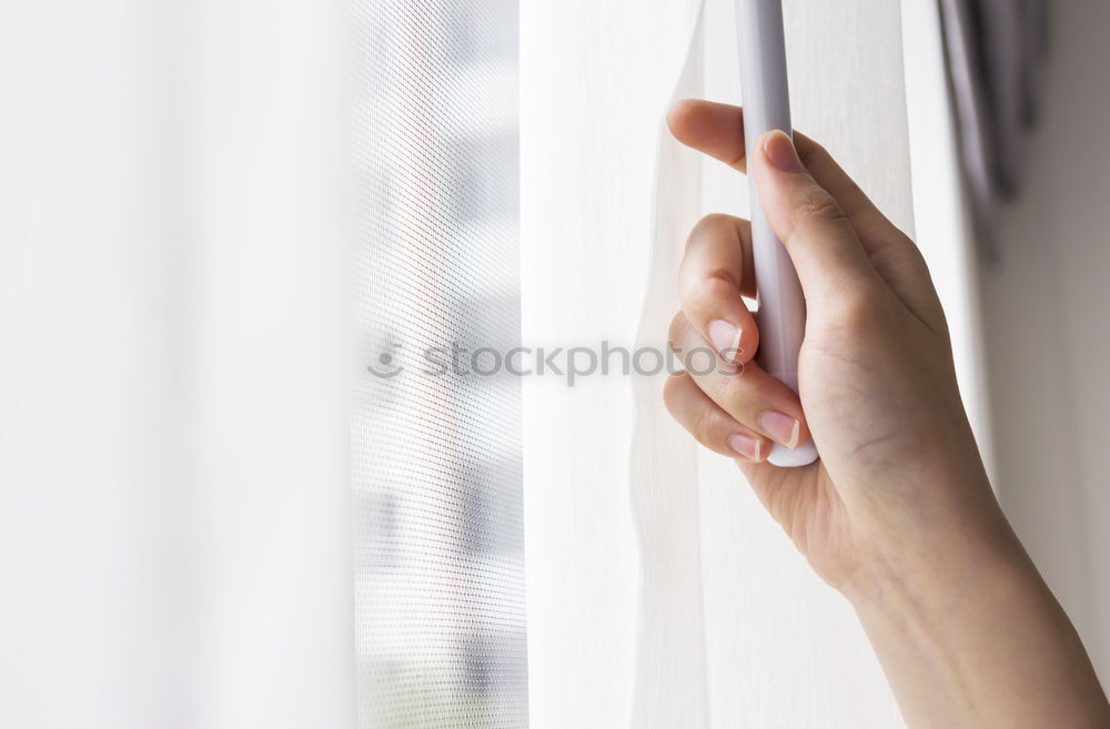 Similar – Dreaming girl looking away in window