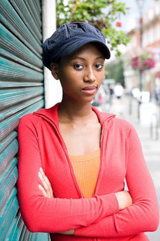 Similar – Image, Stock Photo Portrait of a cheerful young african woman standing outdoors