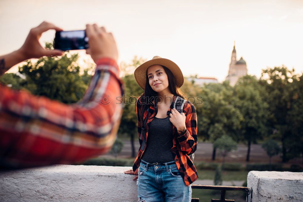 Similar – Image, Stock Photo Lady with camera on shore near stones and water