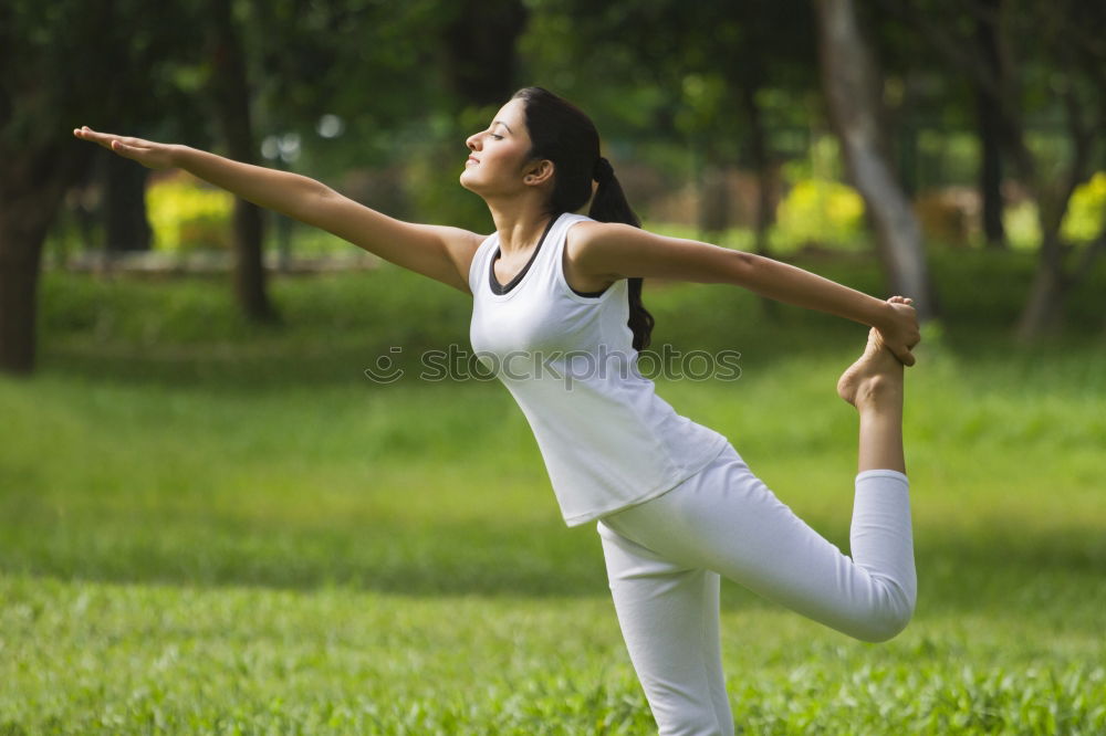 Similar – Image, Stock Photo Young Arab woman doing yoga in nature.