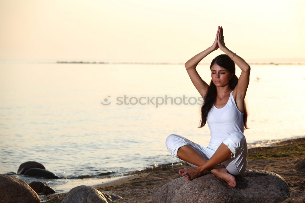 Similar – Young woman doing yoga in Nature.