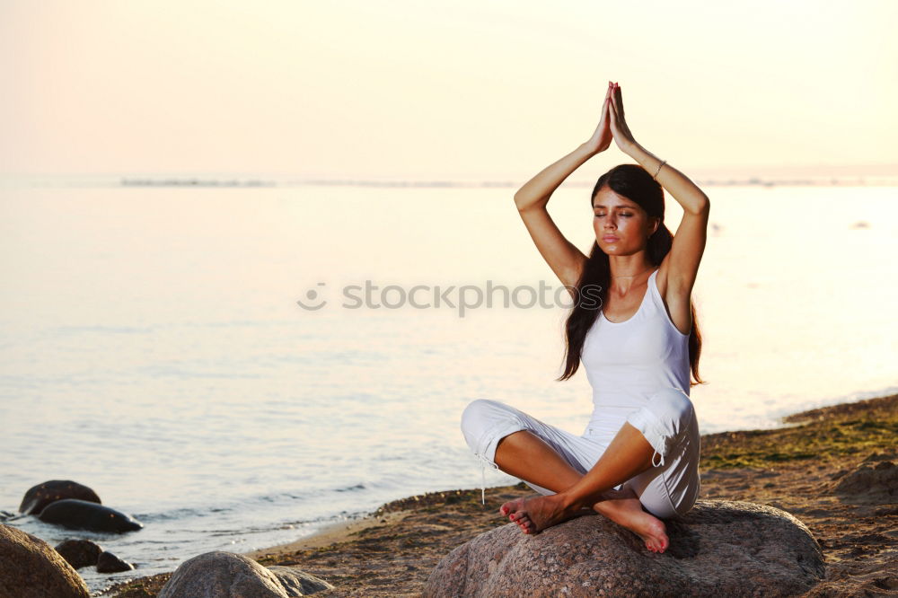 Similar – Young woman doing yoga in Nature.