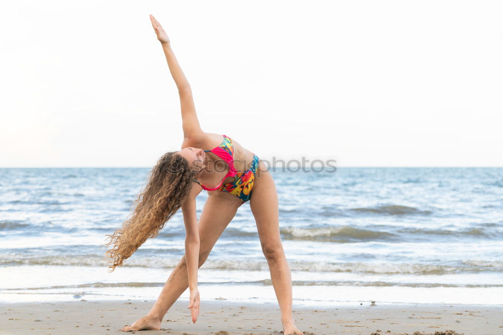 Similar – Image, Stock Photo African American woman doing yoga exercise on beach