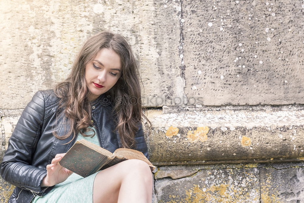 Similar – pretty young woman reading a book