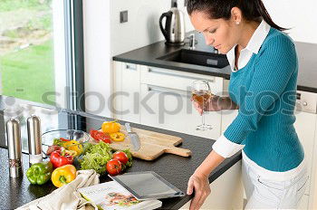 Similar – Woman preparing sandwiches in kitchen