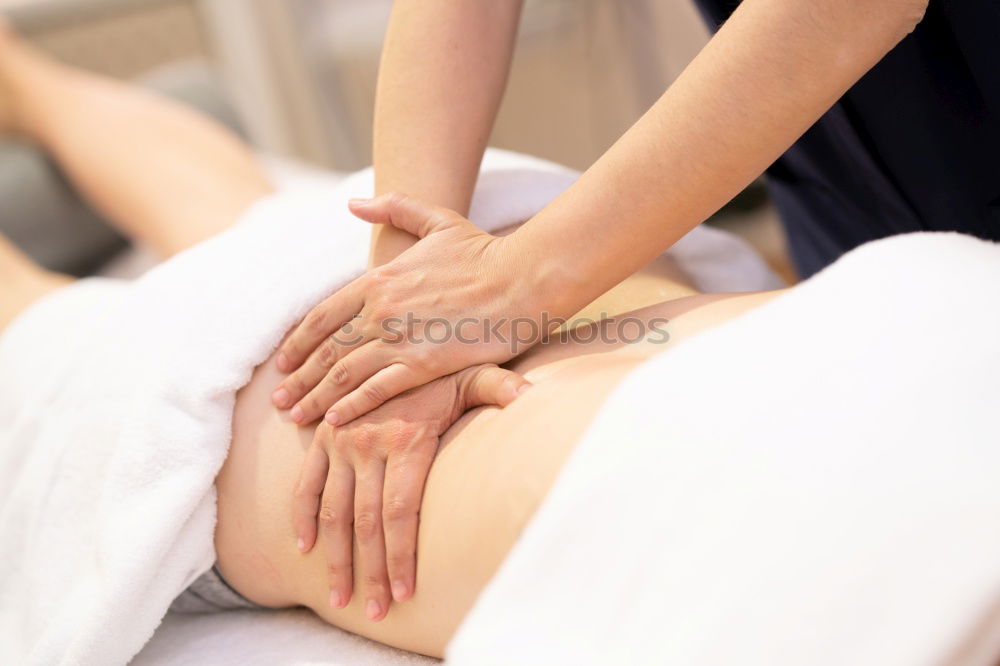 Similar – Image, Stock Photo Woman receiving massage on shoulders in clinical center