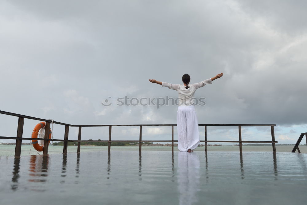 Similar – Image, Stock Photo Pretty women sitting on roof