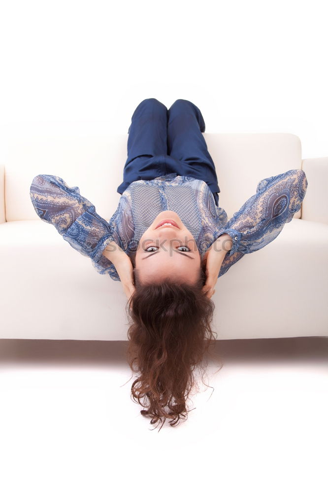 Image, Stock Photo Young girl looking at mobile phone while sitting on bed