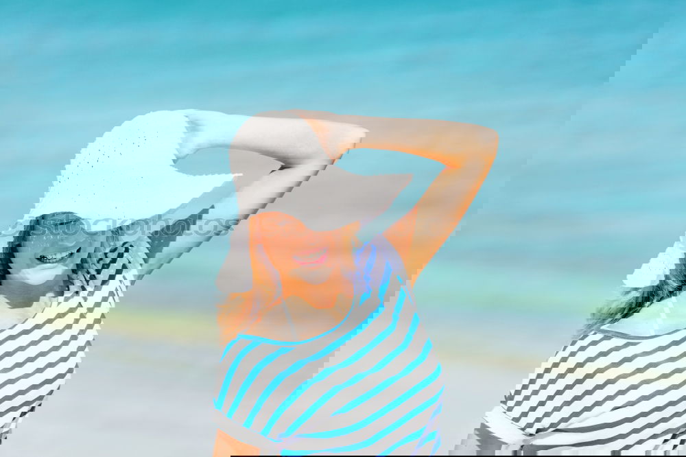 Image, Stock Photo Little girl with umbrella standing on the beach at the day time