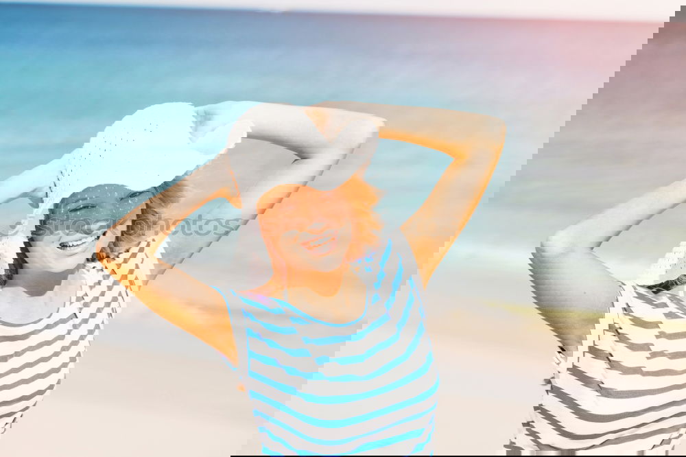 Similar – Image, Stock Photo Little girl with umbrella standing on the beach at the day time