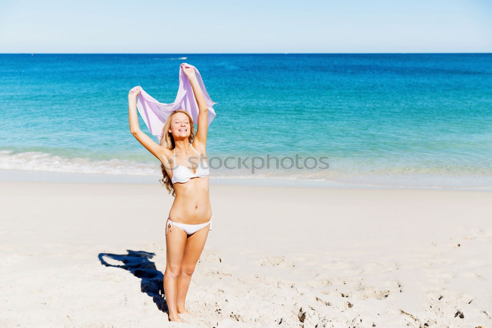 Similar – Image, Stock Photo Caucasian blonde woman practicing yoga in the beach