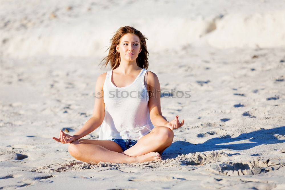 Similar – Young woman doing yoga in nature.