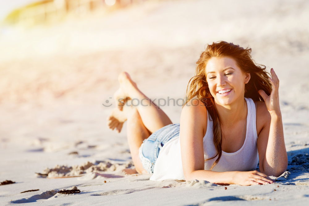 Similar – Image, Stock Photo Beautiful woman with sports clothes, sitting on a concrete wall outdoors at sunset.