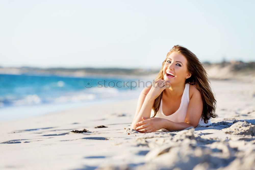 Similar – Süßes fröhliches kleines Mädchen, das im Badeanzug am Strand mit Sand spielt, ein Herz zeichnet und schreibt. Wunderschöner Sommersonnenuntergang, Meer, Kokospalmen, malerische exotische Landschaft. Phuket, Thailand