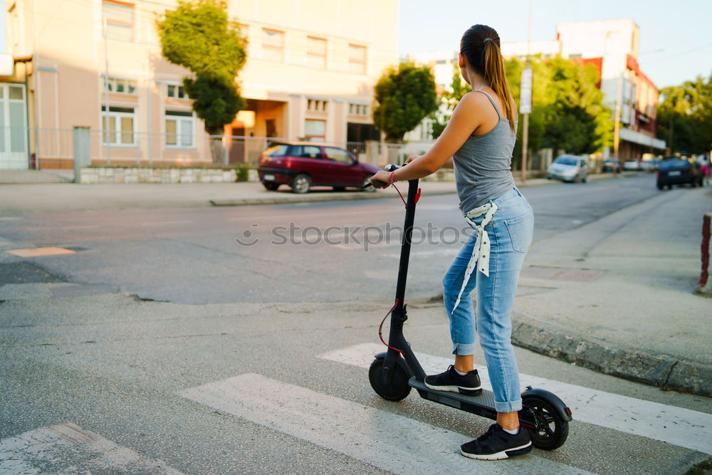 Similar – Foto Bild Frau mittleren Alters auf einem Elektroroller