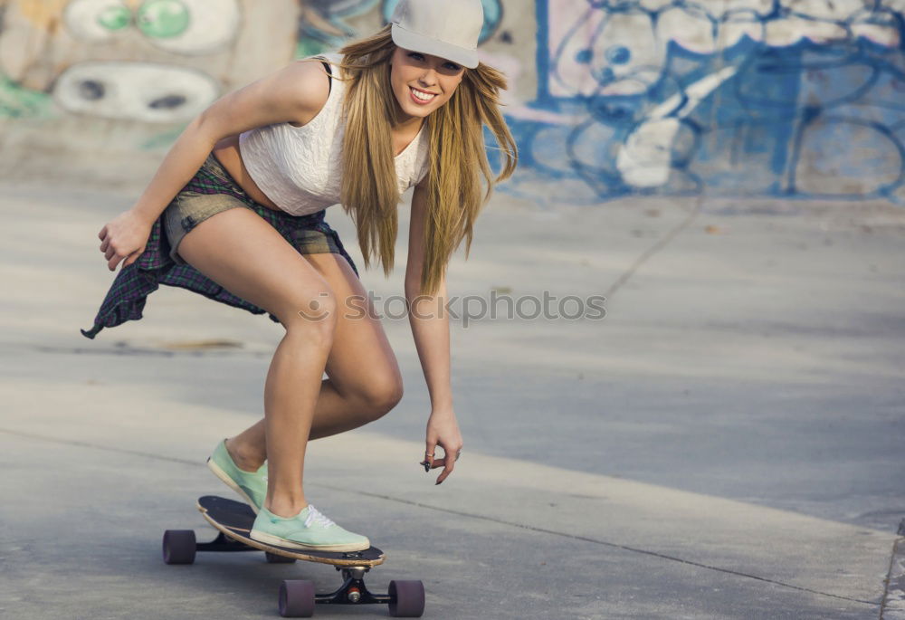 Similar – anonymous young woman skater