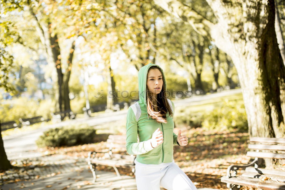 Similar – Image, Stock Photo sports woman doing lawn exercises and stretching on the grass outdoor in a park listening music