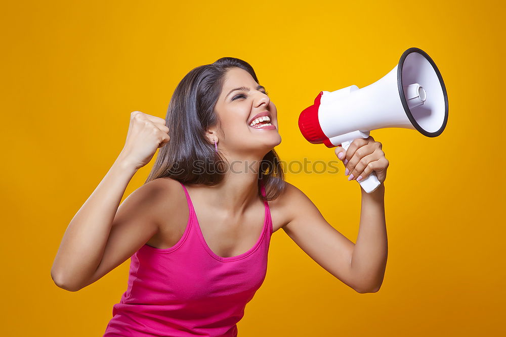 Similar – Female hand holding megaphone