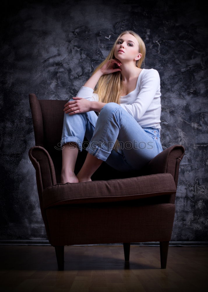 Image, Stock Photo Woman with book on sofa