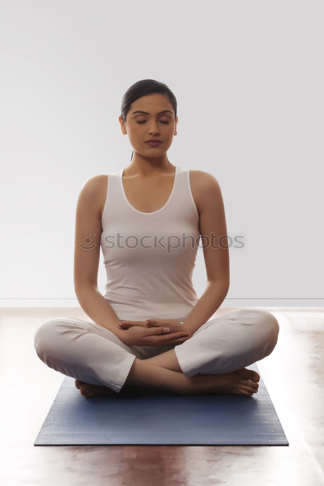 Similar – Teen girl doing yoga at home