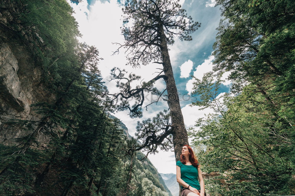 Similar – 2 people hiking show their hiking boots