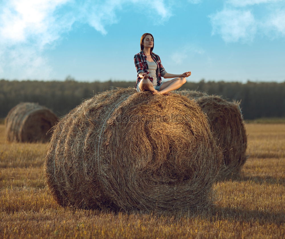 Similar – Woman in big round hat in middle of wheat field