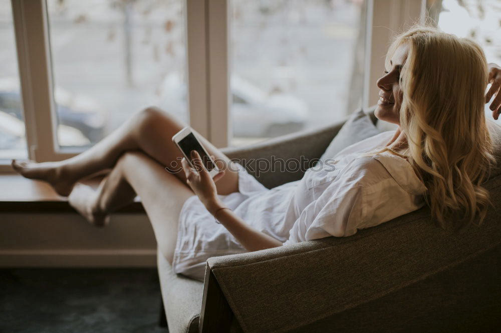 Similar – Image, Stock Photo Thoughtful blonde woman at window