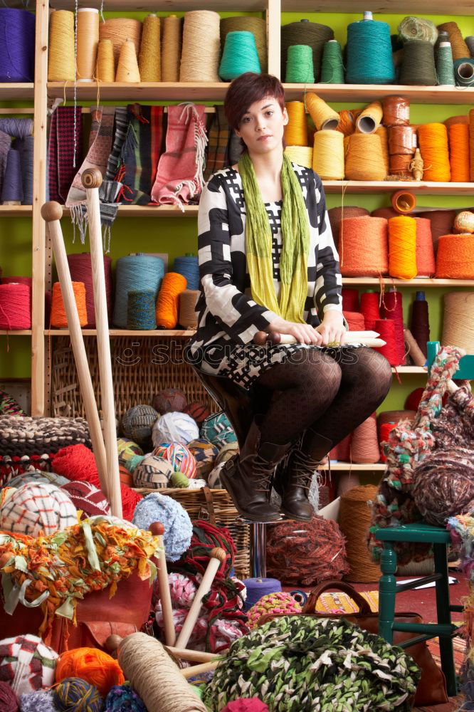 Similar – Image, Stock Photo Pretty sian woman in clothes store