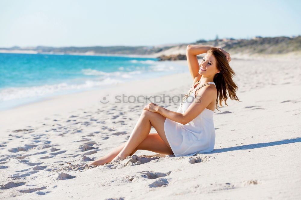 Similar – Süßes fröhliches kleines Mädchen, das im Badeanzug am Strand mit Sand spielt, ein Herz zeichnet und schreibt. Wunderschöner Sommersonnenuntergang, Meer, Kokospalmen, malerische exotische Landschaft. Phuket, Thailand