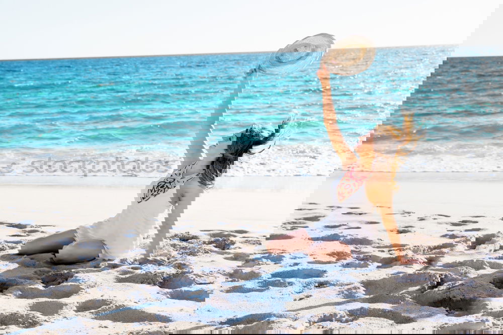 Similar – Image, Stock Photo young girl in a straw hat on the background of the sea