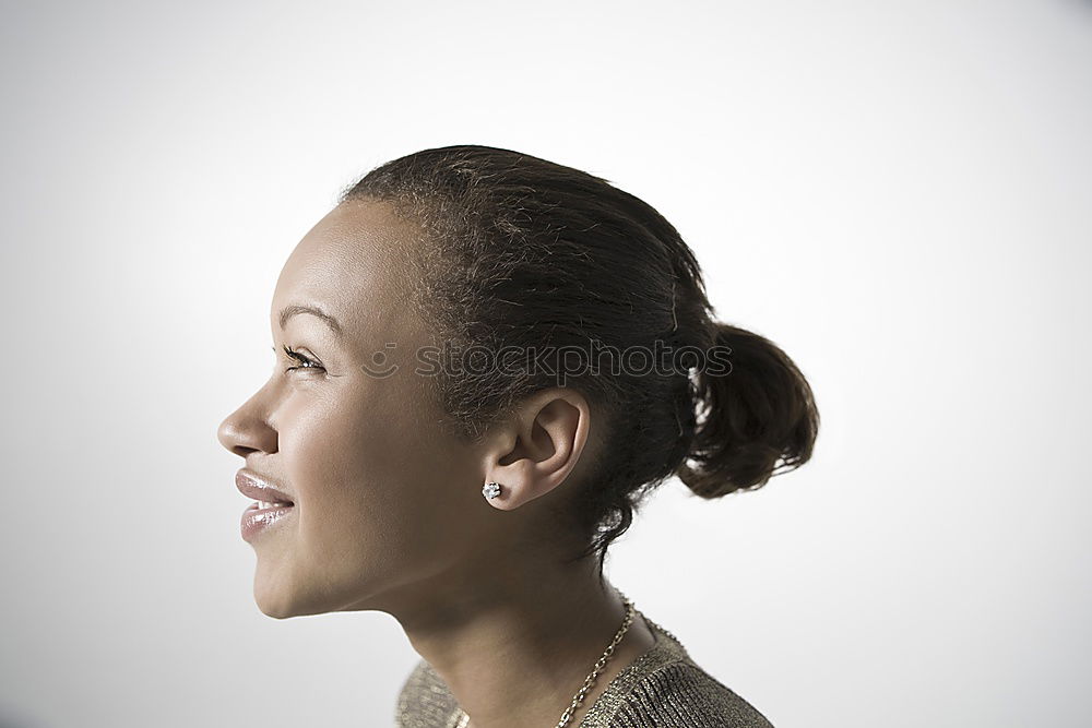 Similar – Close portrait of beautiful young woman with green eyes smiling at camera