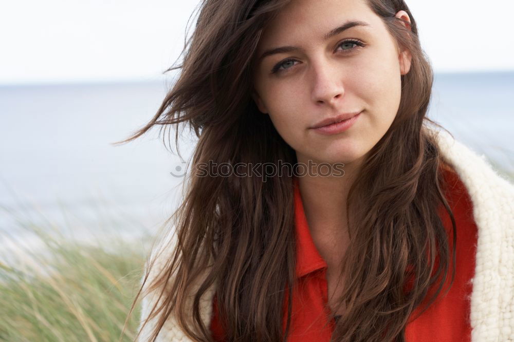 Similar – Julia, young woman looks into the distance.