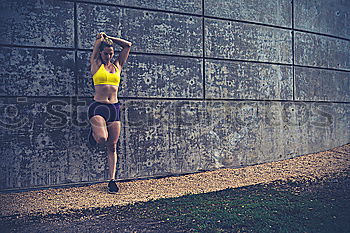 Similar – Image, Stock Photo Young athlete couple doing stretching exercise together