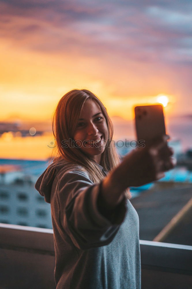 Similar – Blonde white woman holding an old VHS tape and playing with it.